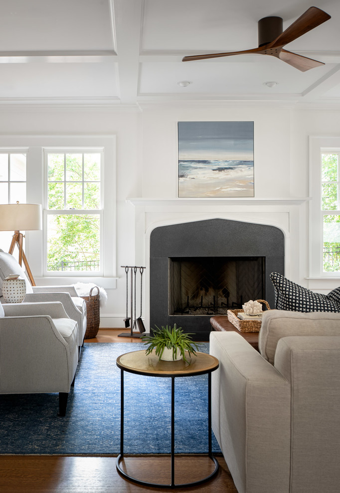 Living room - large coastal open concept light wood floor living room idea in Atlanta with white walls, a standard fireplace and a stone fireplace