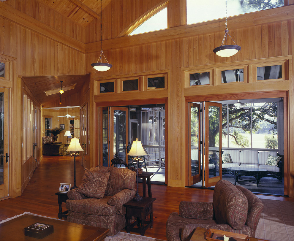 Modelo de salón clásico con suelo de madera oscura