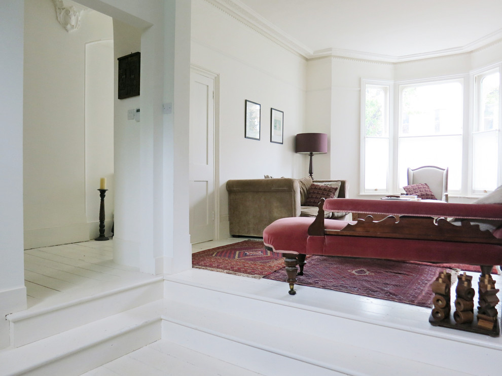 Living room - victorian white floor living room idea in London with white walls