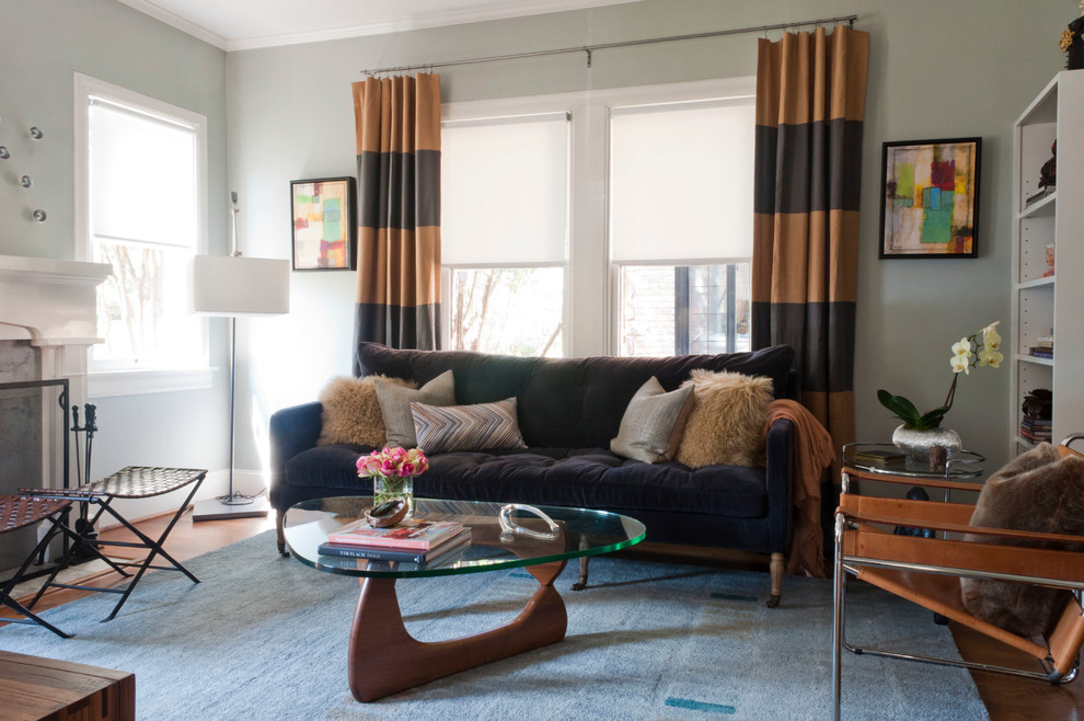 Ispirazione per un soggiorno contemporaneo di medie dimensioni e chiuso con pareti verdi e tappeto