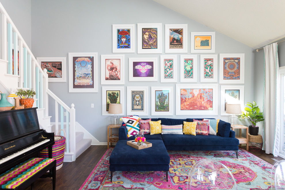 Inspiration for an eclectic open concept living room remodel in Kansas City with gray walls