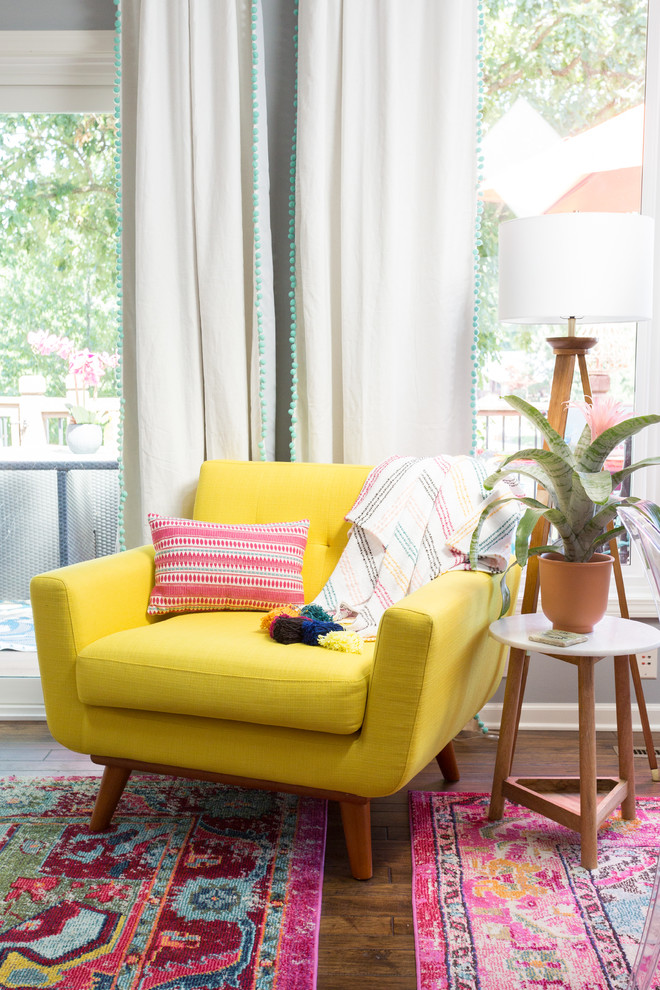 Eclectic open concept living room photo in Kansas City with gray walls