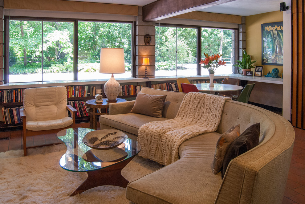 Living room - 1960s living room idea in Philadelphia with brown walls