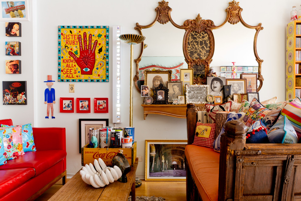 Photo of an eclectic enclosed living room in New York with white walls.