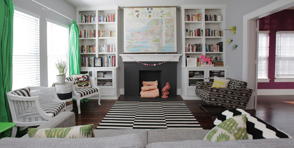 Large eclectic living room library photo in Dallas with no tv