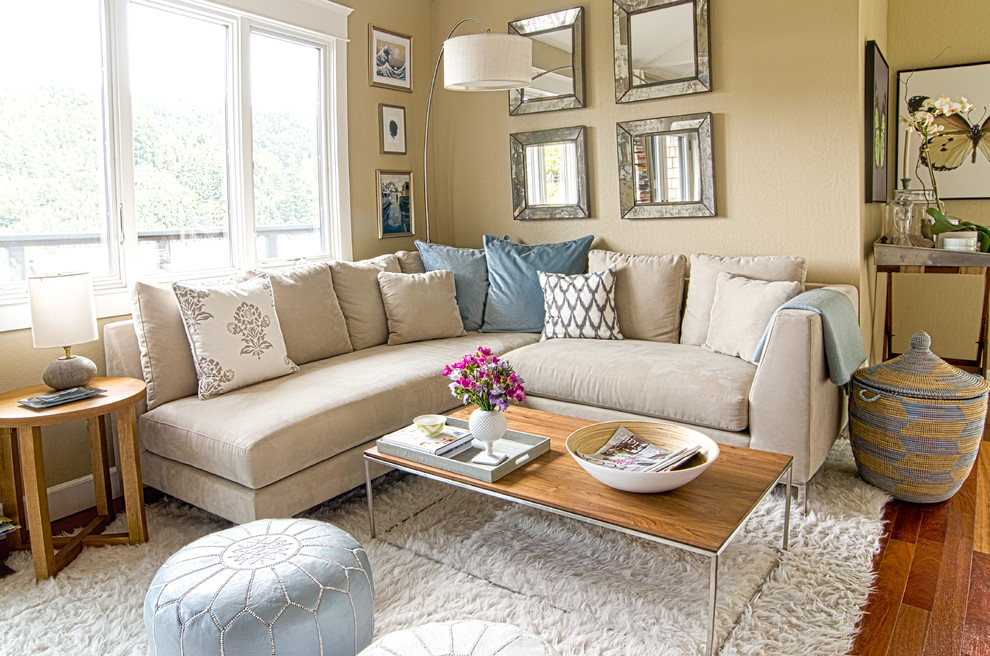 Example of a cottage chic living room design in San Francisco with beige walls