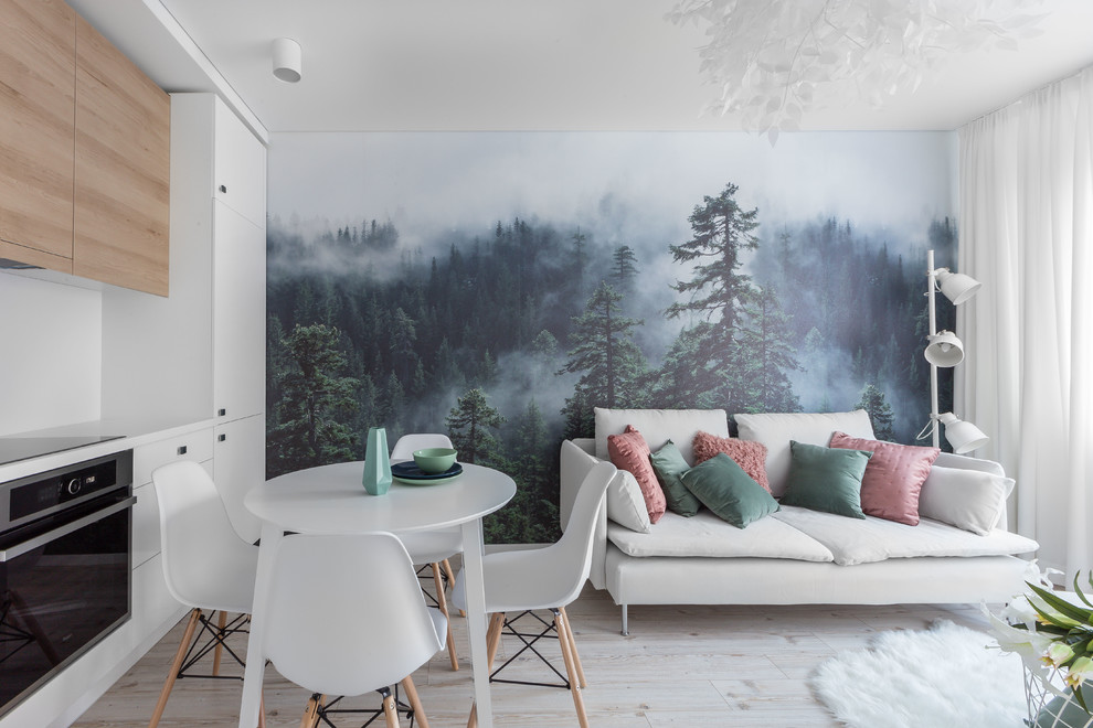 Ejemplo de salón abierto nórdico con paredes blancas, suelo beige y suelo de madera clara