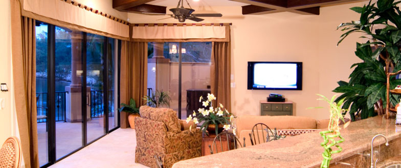 Example of a tuscan living room design in Tampa