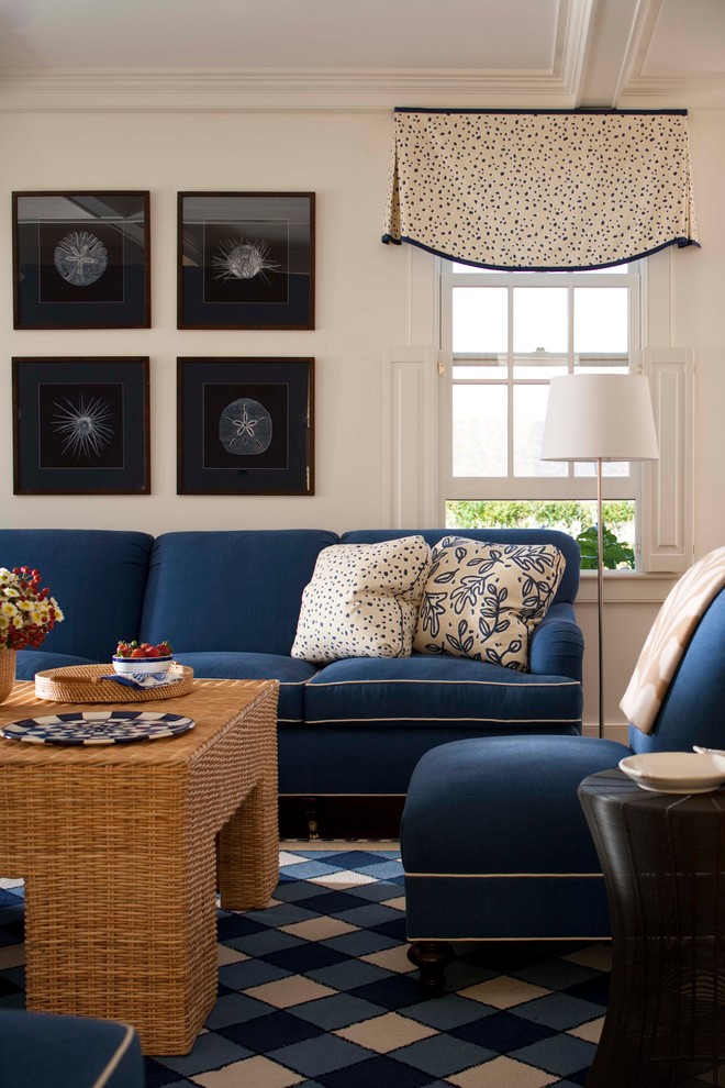 Inspiration for a mid-sized timeless enclosed carpeted living room remodel in Boston with white walls, a standard fireplace and a metal fireplace