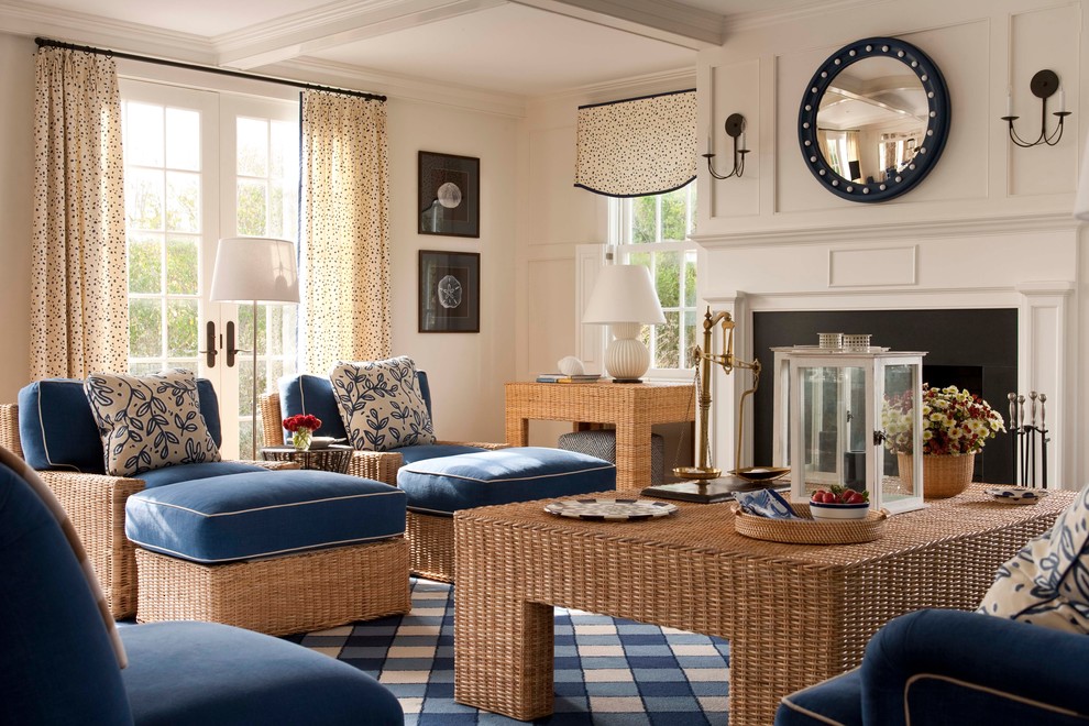 Example of a mid-sized beach style enclosed carpeted living room design in Boston with white walls, a standard fireplace and a metal fireplace
