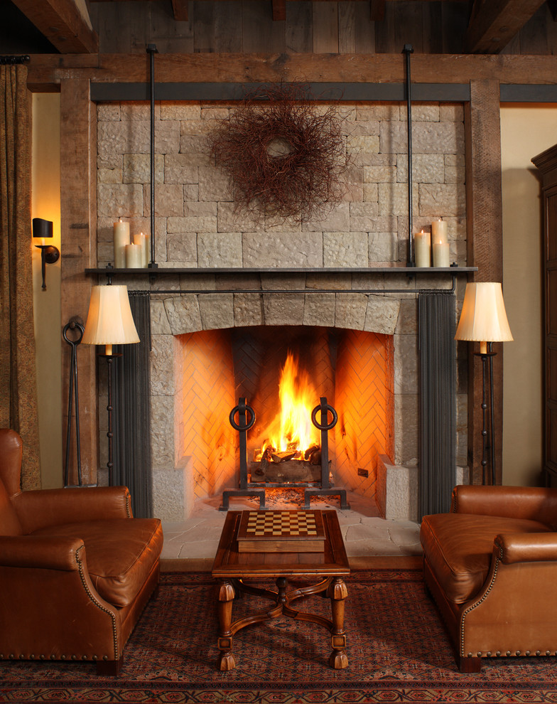 Inspiration for a country formal living room in Los Angeles with a standard fireplace, beige walls and a stone fireplace surround.