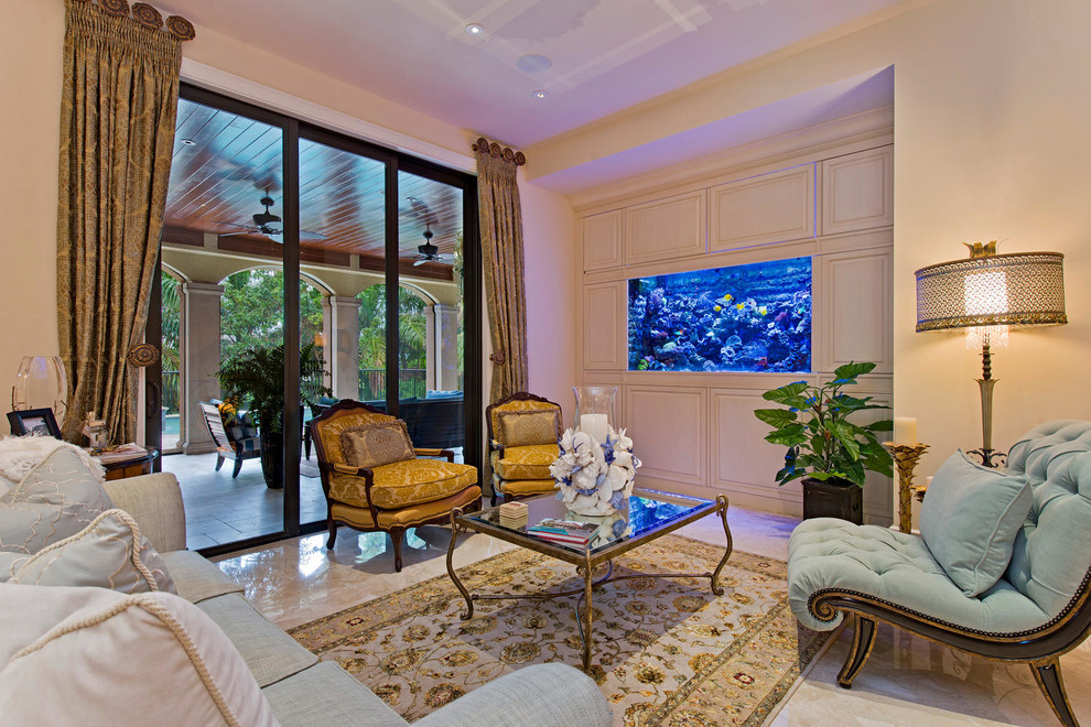 Example of a classic living room design in Miami with beige walls