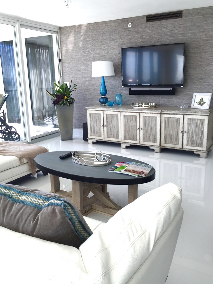 Large minimalist open concept porcelain tile living room photo in Miami with gray walls, no fireplace and a wall-mounted tv