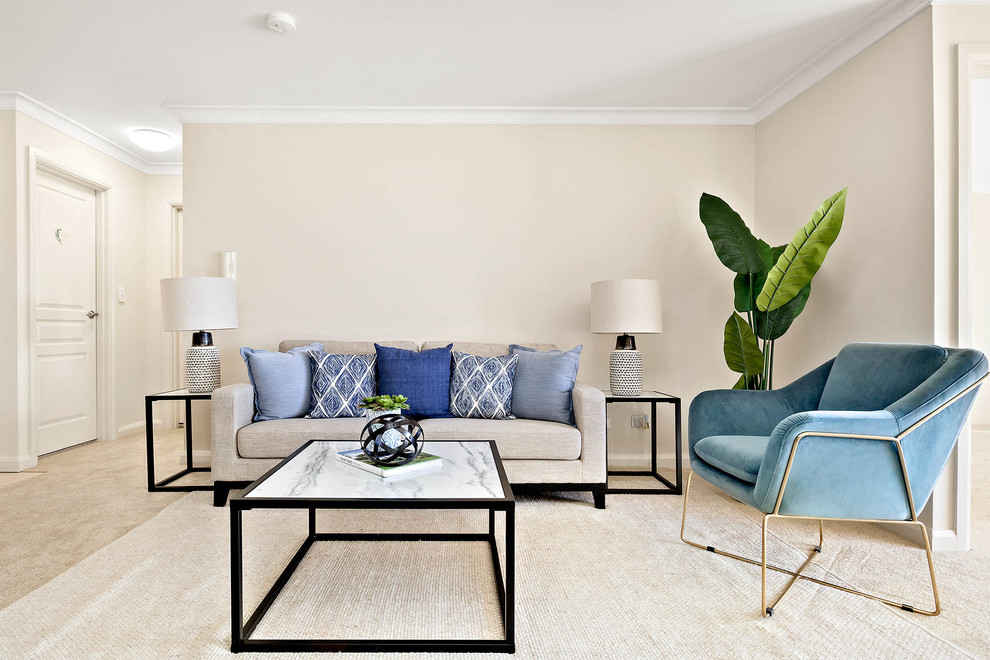 Design ideas for a contemporary living room in Sydney with carpet.