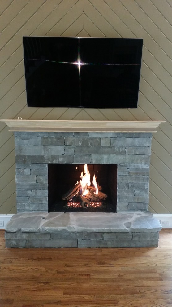 Natural stone fireplace makeover Traditional Living Room Atlanta