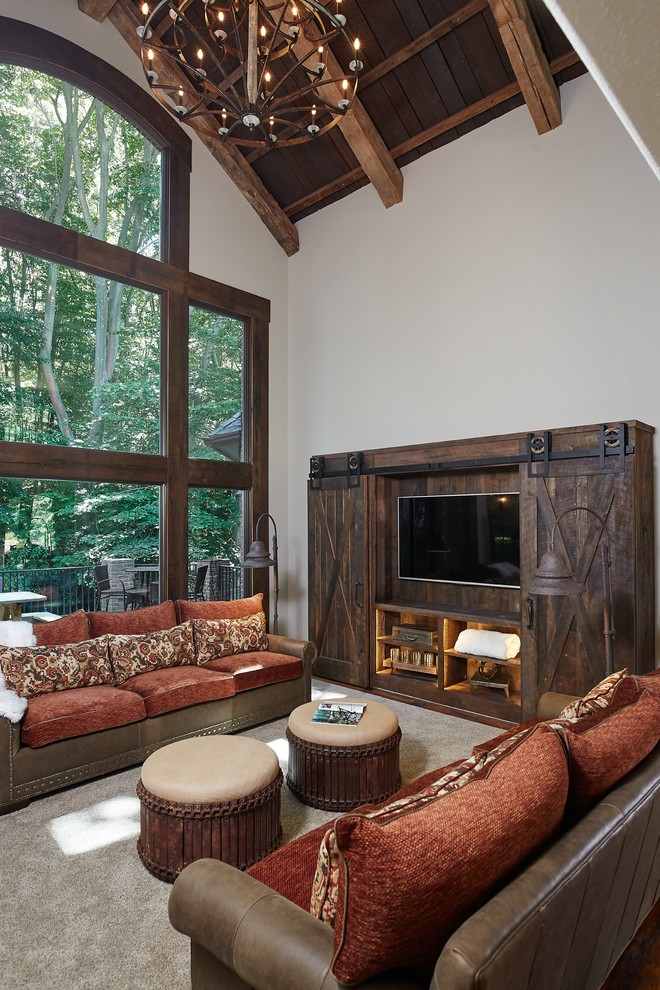 This is an example of a rustic living room in Grand Rapids.