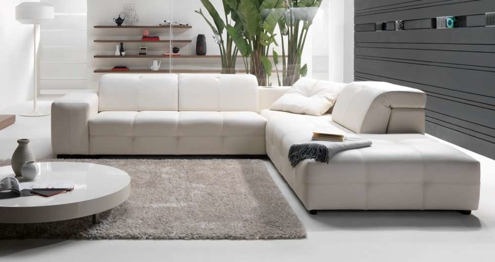 Ispirazione per un grande soggiorno minimalista aperto con sala formale, pareti bianche, nessun camino, nessuna TV e pavimento grigio