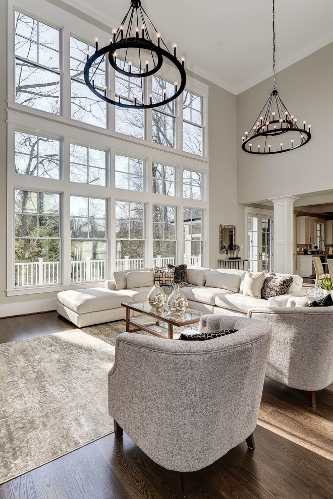 Living room - traditional open concept dark wood floor and brown floor living room idea in DC Metro with gray walls