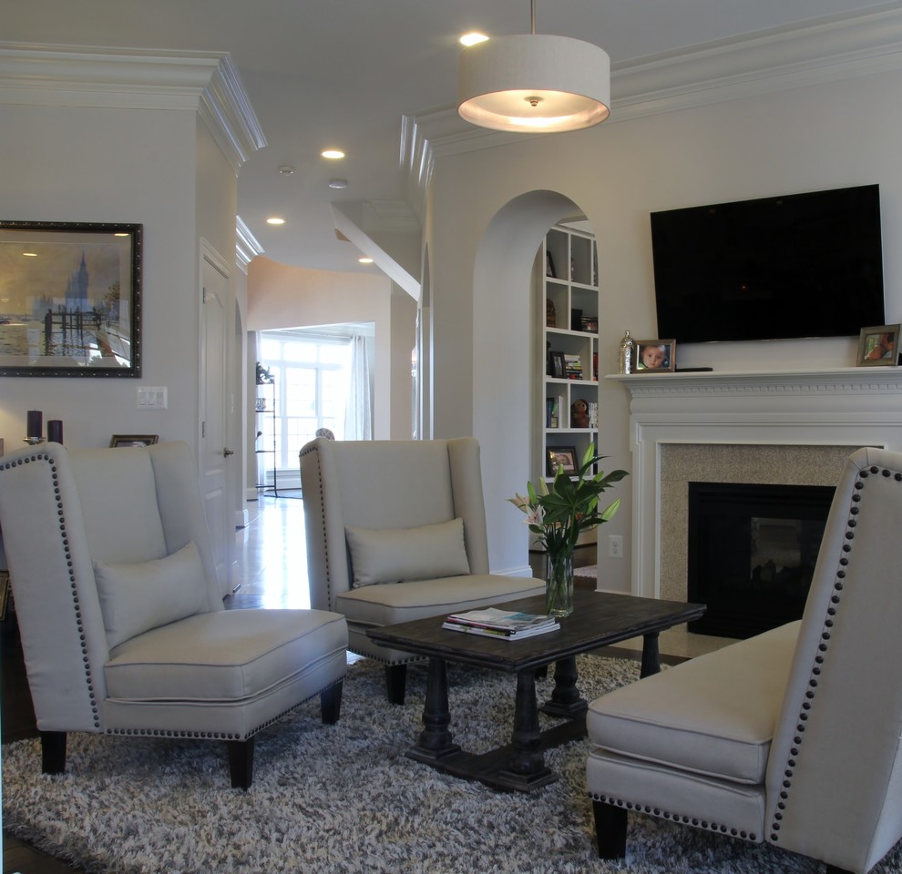 Large transitional formal dark wood floor living room photo in DC Metro with gray walls and a standard fireplace