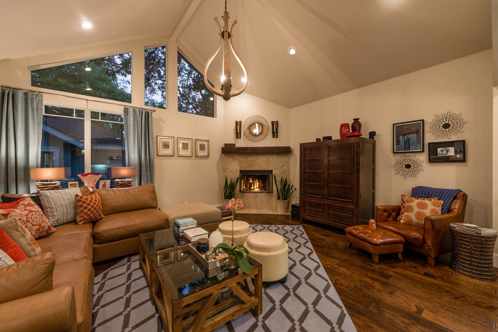 Inspiration for a contemporary living room remodel in Austin with a corner fireplace and a tile fireplace