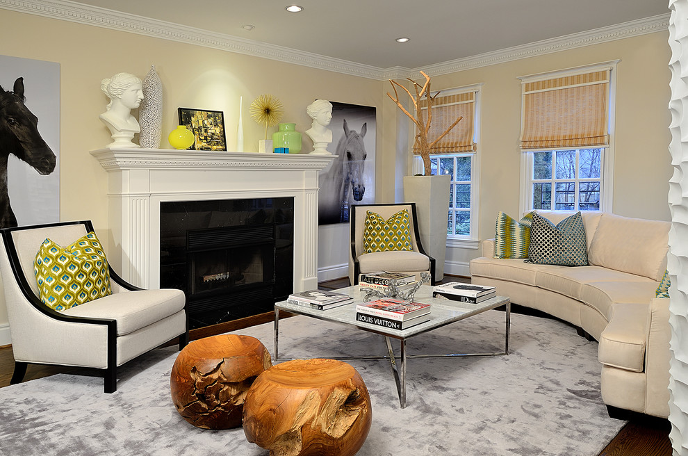 Eclectic living room photo in Toronto with beige walls and a standard fireplace