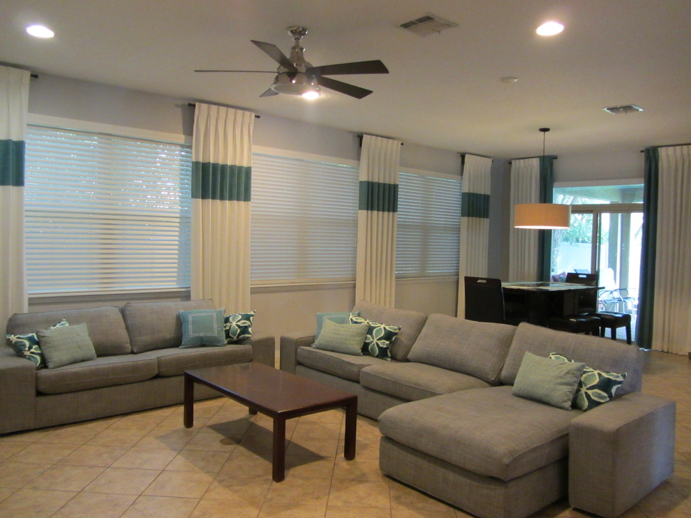 Inspiration for a classic grey and teal living room in Orlando.