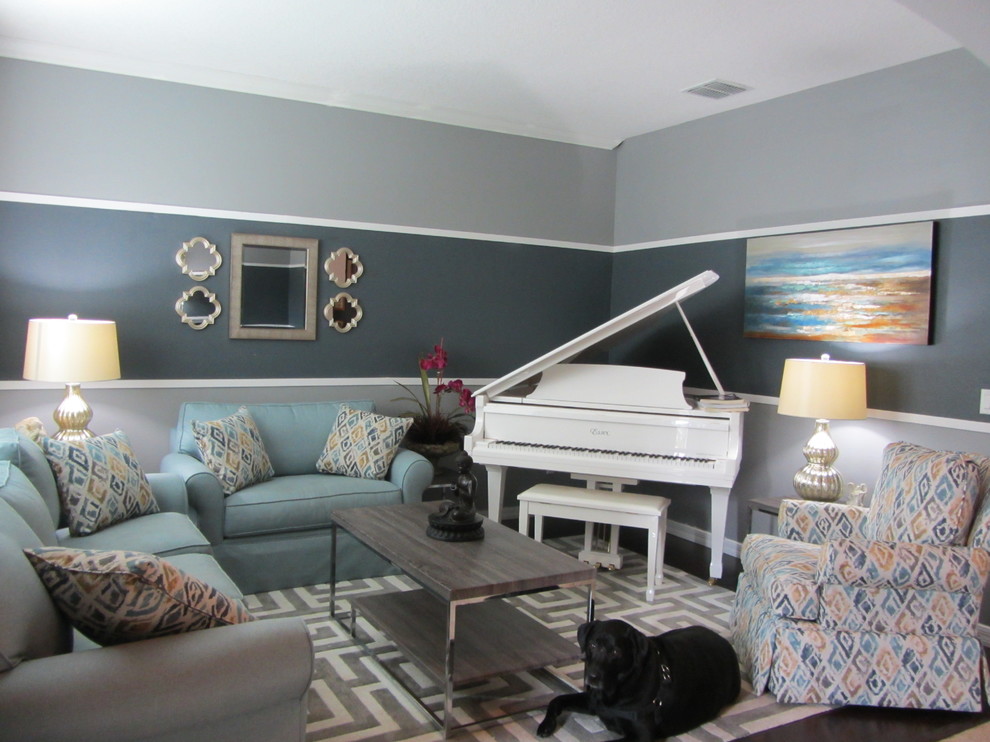 Inspiration for a classic enclosed living room in Orlando with grey walls.