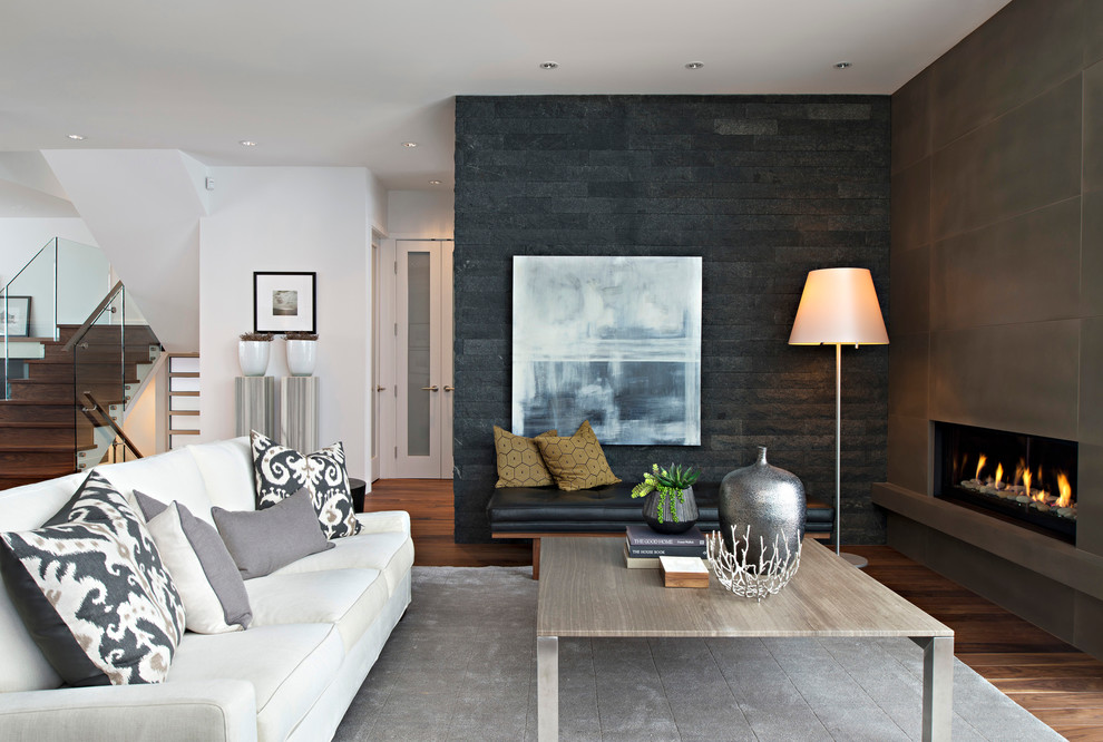Photo of a contemporary open plan living room in Vancouver with a ribbon fireplace.