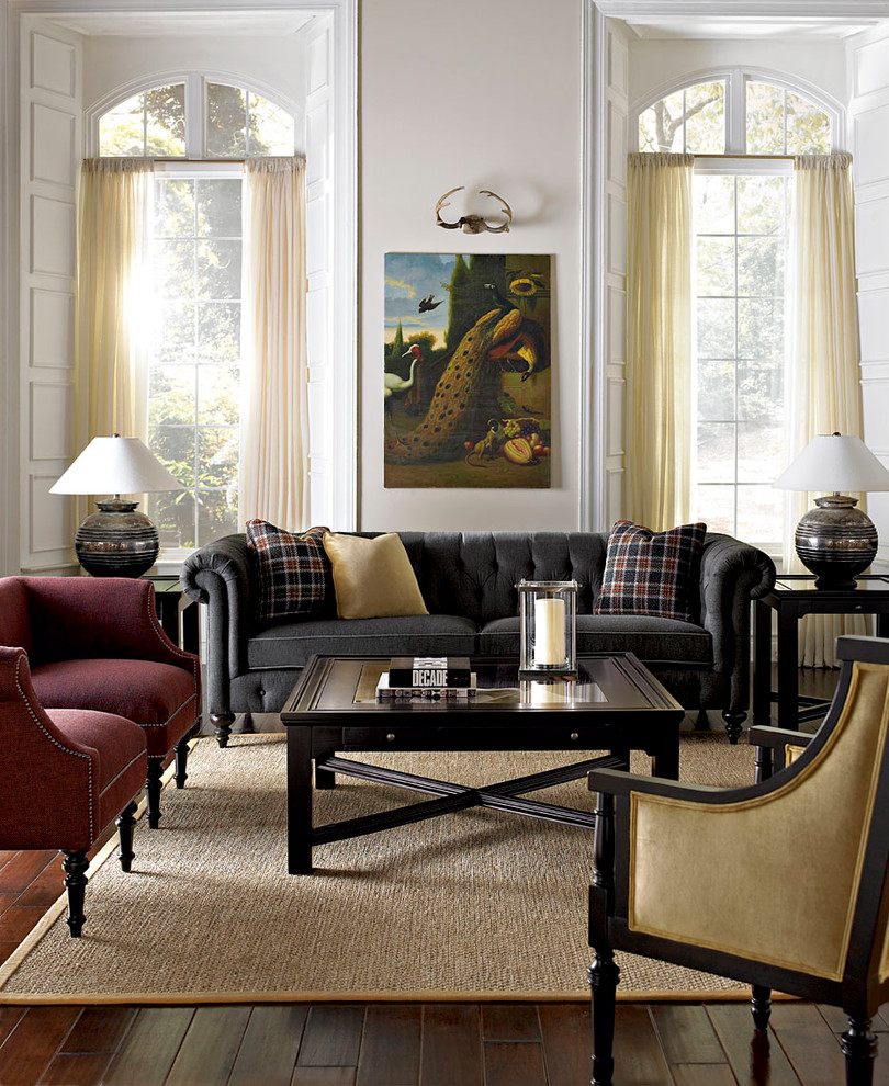 Photo of a contemporary formal living room in Other with white walls, dark hardwood flooring and no tv.