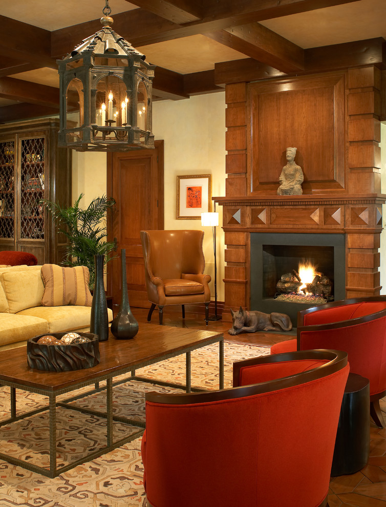 Inspiration for a timeless living room remodel in Philadelphia with a standard fireplace and a wood fireplace surround