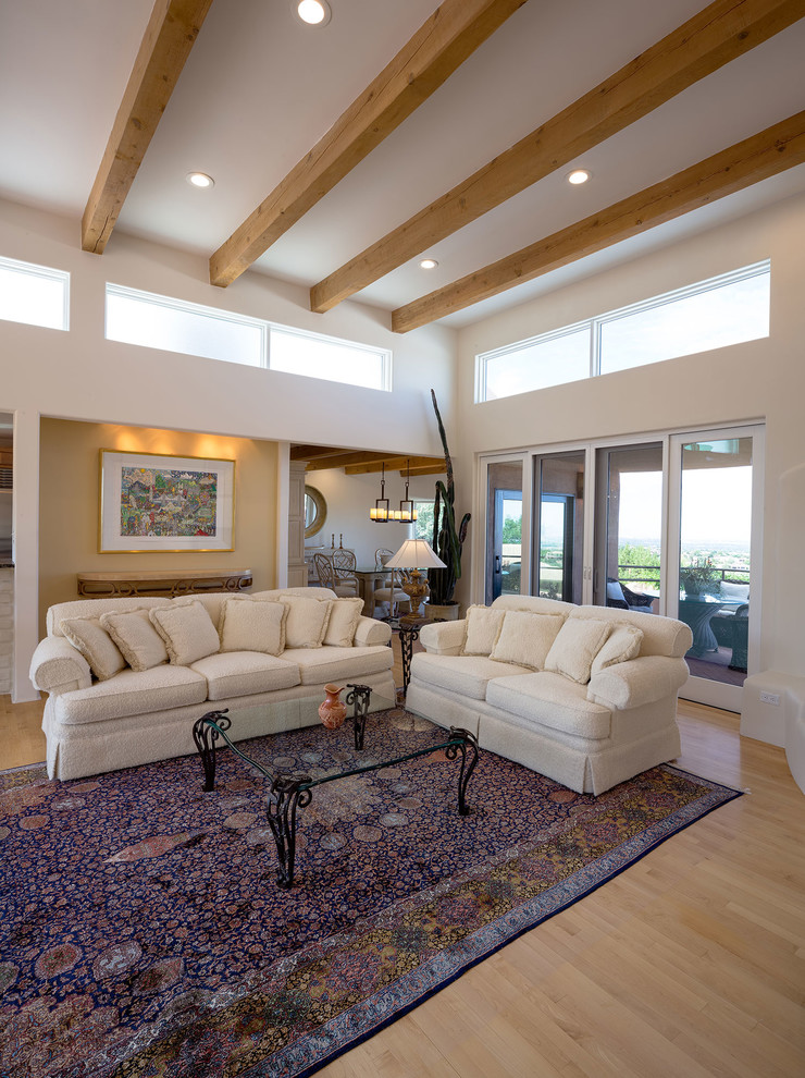 Living room - large traditional formal and open concept light wood floor living room idea in Atlanta with beige walls