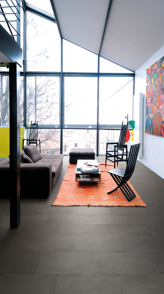 Living room - contemporary formal medium tone wood floor living room idea in Dublin with white walls