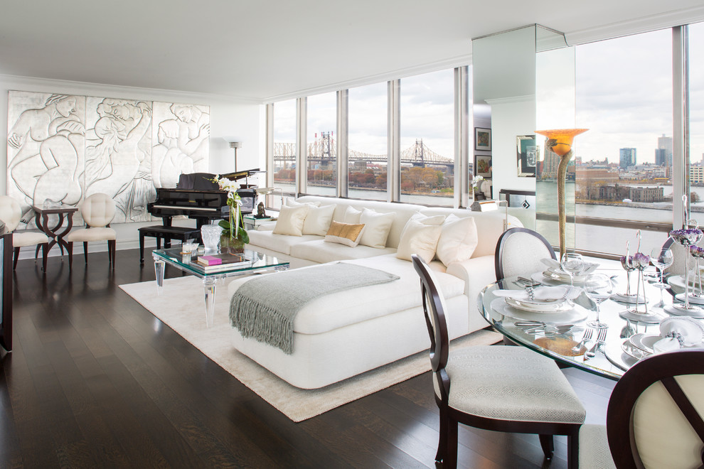 Photo of an expansive contemporary living room in New York with a music area.