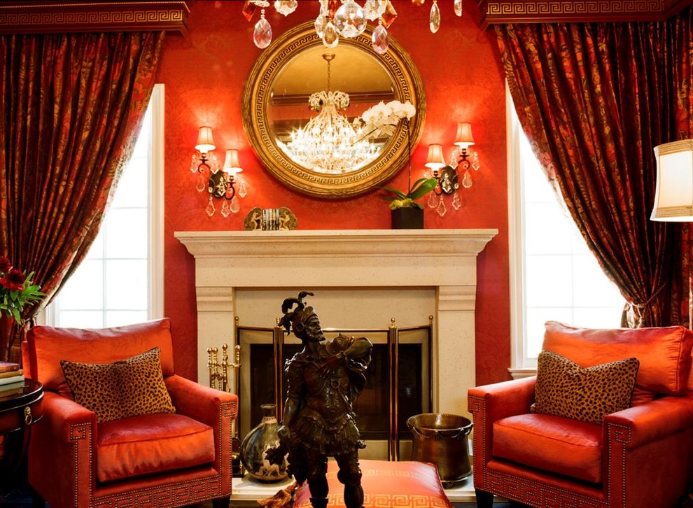 Living room - traditional living room idea in Los Angeles with red walls and a standard fireplace