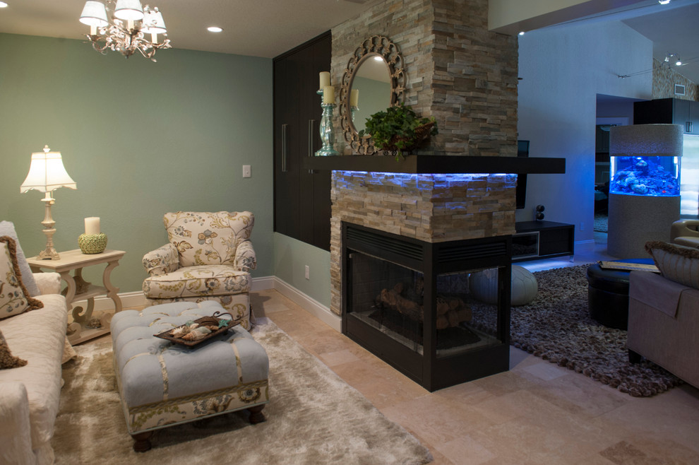 This is an example of a medium sized contemporary open plan living room in Atlanta with green walls, travertine flooring, a corner fireplace, a stone fireplace surround and a wall mounted tv.