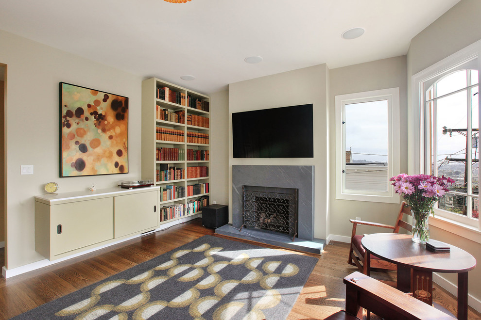 Inspiration for a contemporary living room in San Francisco with a stone fireplace surround.