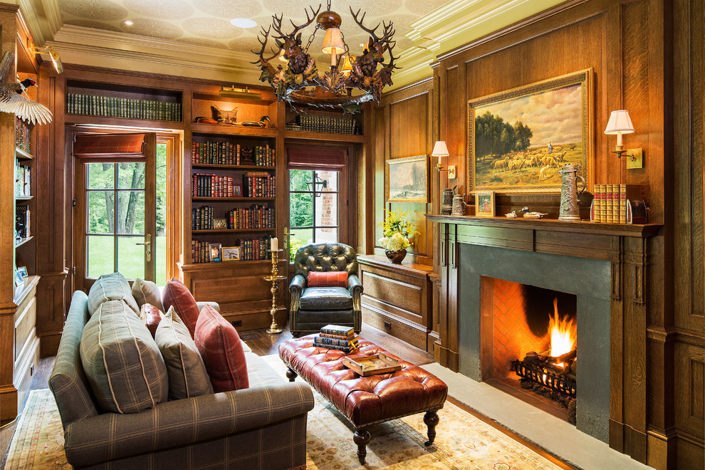 Traditional enclosed living room in New York with brown walls and dark hardwood flooring.