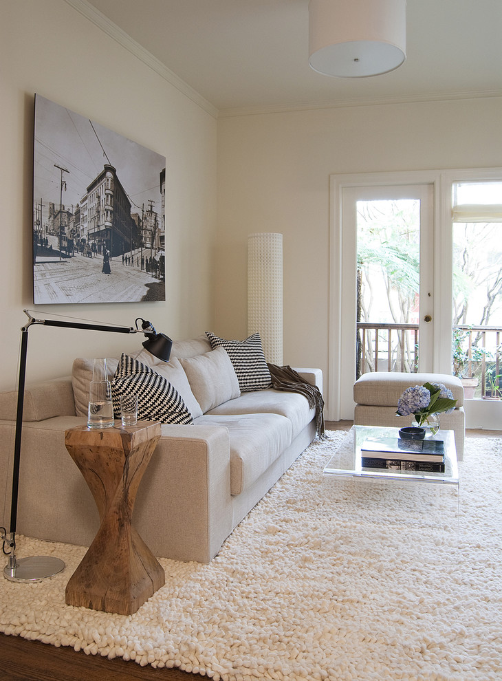 Living room - mid-sized transitional enclosed dark wood floor living room idea in San Francisco with white walls