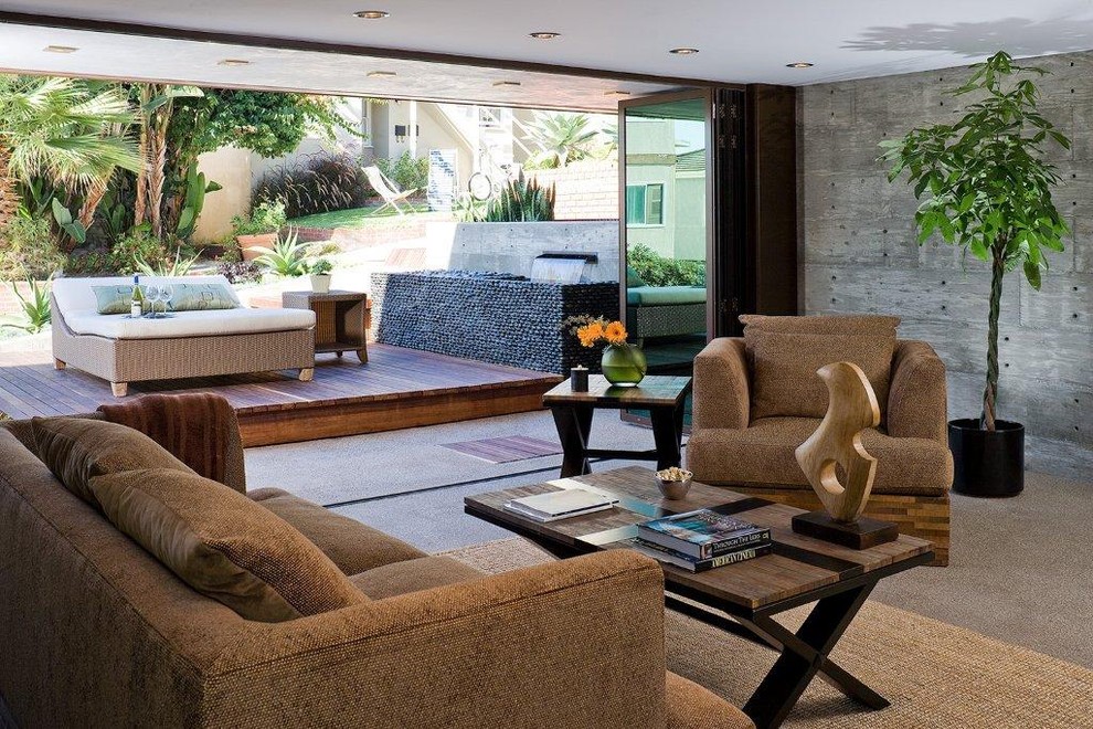 Living room - large contemporary open concept concrete floor living room idea in Los Angeles with gray walls