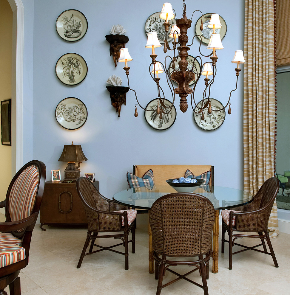 Large elegant beige floor dining room photo in Miami with blue walls