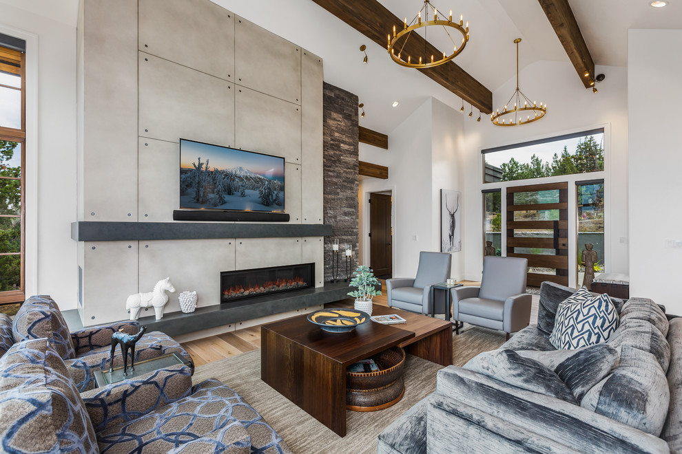 Inspiration for a medium sized contemporary open plan living room in Other with white walls, light hardwood flooring, a ribbon fireplace, a concrete fireplace surround, a wall mounted tv and brown floors.