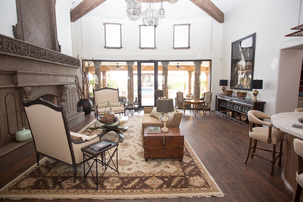 Living room - huge eclectic formal and open concept dark wood floor living room idea in Phoenix with a standard fireplace, a stone fireplace and white walls
