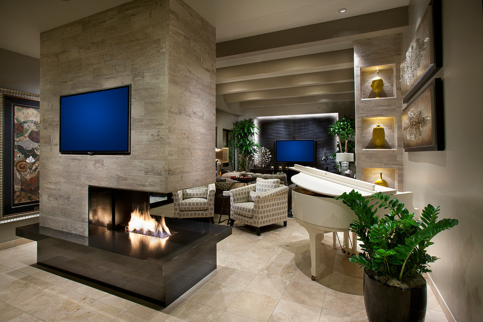 フェニックスにある高級な広いコンテンポラリースタイルのおしゃれなリビング (大理石の床、両方向型暖炉、タイルの暖炉まわり、ベージュの壁、壁掛け型テレビ) の写真