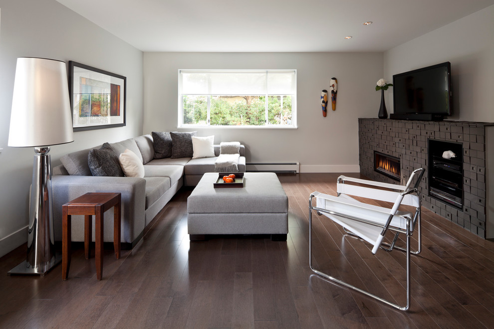 Источник вдохновения для домашнего уюта: гостиная комната в современном стиле с серыми стенами