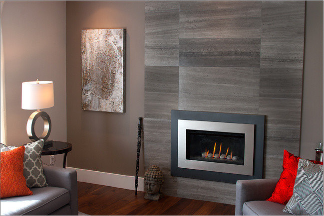 Photo of a large contemporary formal open plan living room in Vancouver with grey walls, dark hardwood flooring, a ribbon fireplace and a stone fireplace surround.