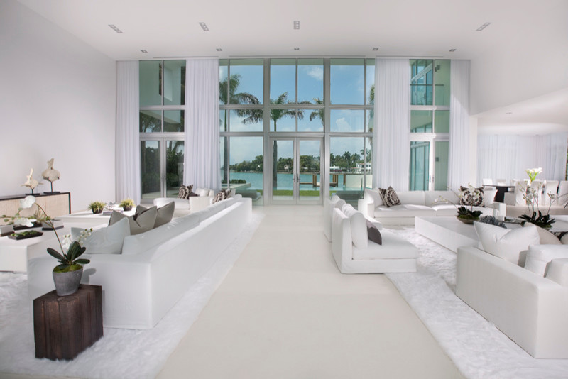 Immagine di un grande soggiorno design stile loft con sala formale, pareti bianche, pavimento in gres porcellanato e nessuna TV