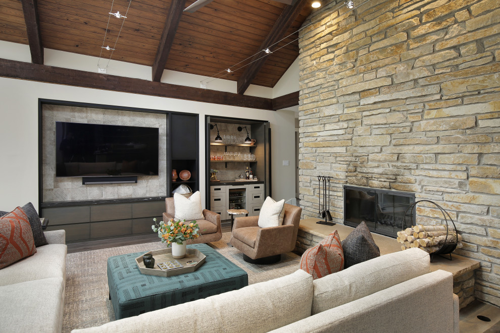 Living room - rustic dark wood floor, brown floor and wood ceiling living room idea in Chicago with white walls, a standard fireplace, a stone fireplace and a wall-mounted tv