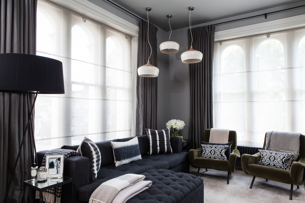 Photo of a contemporary formal living room in London with grey walls.