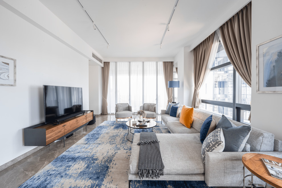 Immagine di un grande soggiorno minimal aperto con pareti bianche e pavimento grigio