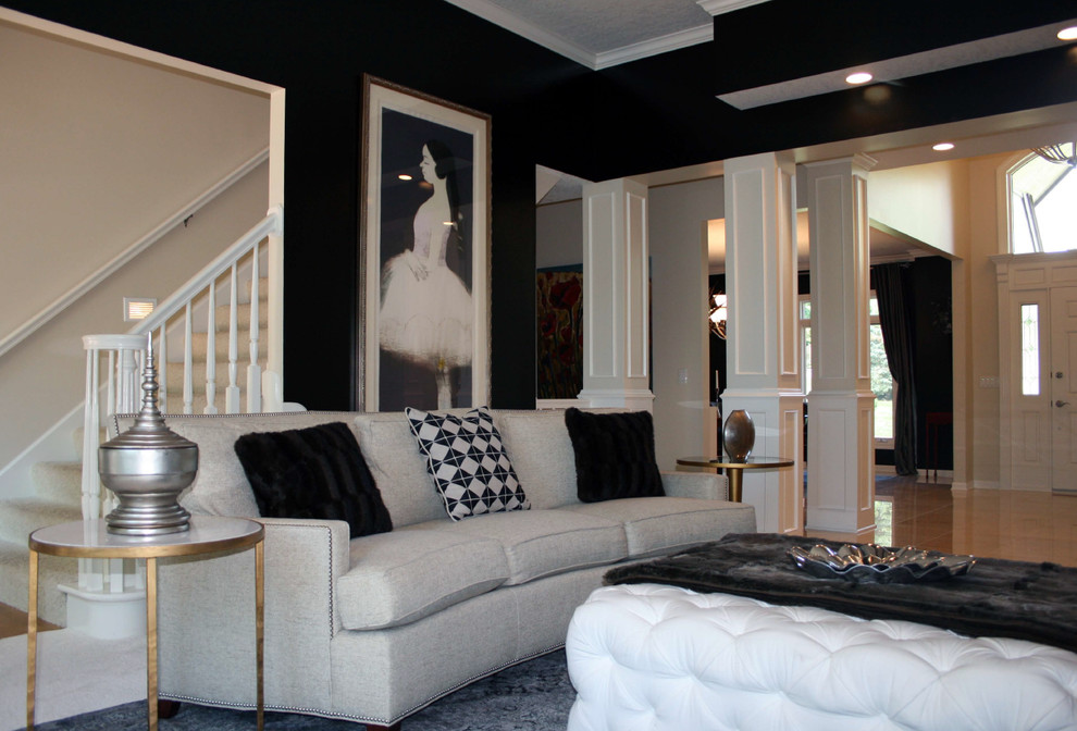 Immagine di un grande soggiorno contemporaneo aperto con pareti nere, moquette, camino classico, cornice del camino in pietra e TV a parete